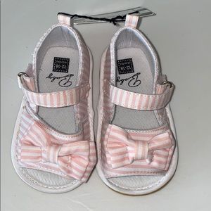 Pink and white striped sandals with bow